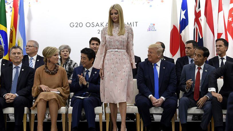 Ivanka Trump stands up to speak at the President G-20 summit event on women's empowerment in Osaka, Japan, in Osaka, Japan, Saturday, June 29, 2019.