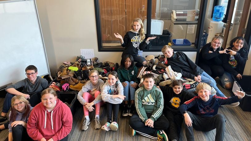 Shawnee Elementary School students collected over 300 shoes to donate to the Springfield and Clark County community. Contributed