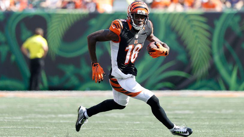 CINCINNATI, OH - SEPTEMBER 25: A.J. Green #18 of the Cincinnati Bengals carries the ball during the fourth quarter of the game against the Denver Broncos at Paul Brown Stadium on September 25, 2016 in Cincinnati, Ohio. (Photo by Joe Robbins/Getty Images)