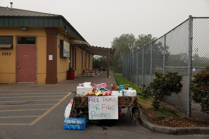 *EMBARGO: No electronic distribution, Web posting or street sales before THURSDAY 3:01 a.m. ET SEPT. 17, 2020. No exceptions for any reasons. EMBARGO set by source.**A donation table for fire evacuees outside a hotel where many are sheltering in Salem, Ore., Sept. 14, 2020. After raging wildfires left them trapped on the shores of a reservoir near Detroit, Ore., dozens of people and nine firefighters mounted a last stand, hoping for a miracle. (Kristina Barker/The New York Times)