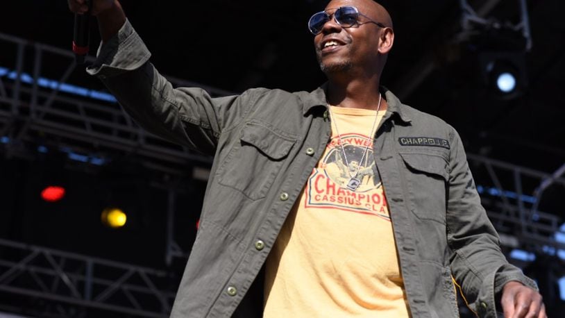 Dave Chappelle on stage for the Gem City Shine event. 
Photo by: Tom Gilliam