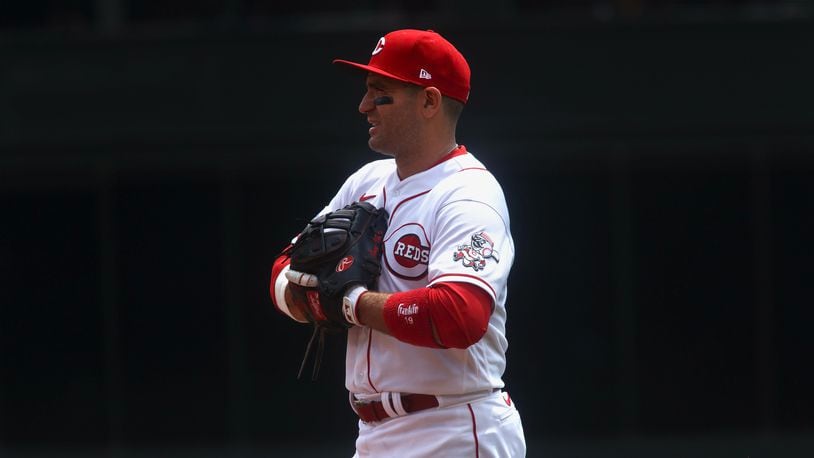 Joey Votto, of the Reds, plays first base against the Rockies on Wednesday, June 21, 2023, at Great American Ball Park in Cincinnati. David Jablonski/Staff