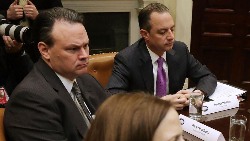White House Deputy Chief of Staff for Legislative, Intergovernmental Affairs and Implementation Rick Dearborn (L), Chief of Staff Reince Priebus, White House Domestic Policy Council health care advisor Katy Talento and others attend a meeting with U.S. President Donald Trump and House of Representatives committee leaders in the Roosevelt Room at the White House March 10, 2017 in Washington, DC. (Photo by Chip Somodevilla/Getty Images)