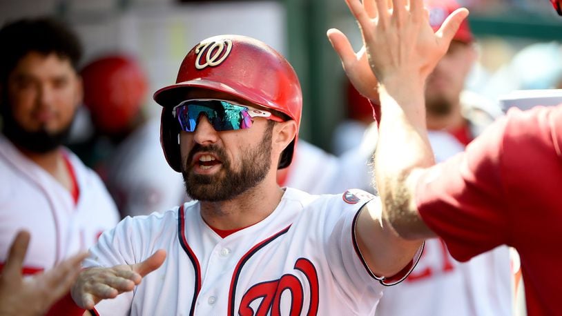 The Nationa’s Adam Eaton celebrates with teammates after scoring during the sixth inning of game one of a doubleheader against the Philadelphia Phillies at Nationals Park on September 24, 2019 in Washington, DC. (Photo by Will Newton/Getty Images)