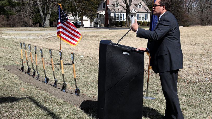 Philip Kirk, Dayton VA Medical Center Chief of Engineering, talks about the new Springfield Community Based Outpatient Clinic on North Limestone Street during the groundbreaking ceremony Tuesday. BILL LACKEY/STAFF