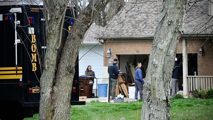 Several bomb squad, including Dayton and Franklin county at a home in Troy on Barnhart Rd., Friday April 5, 2024. MARSHALL GORBY \STAFF