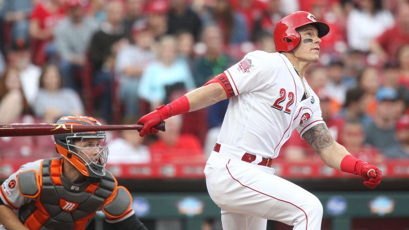 The Reds' Derek Dietrich hits two three-run home runs against the Giants in the first and third innings on Friday, May 3, 2019, at Great American Ball Park in Cincinnati.