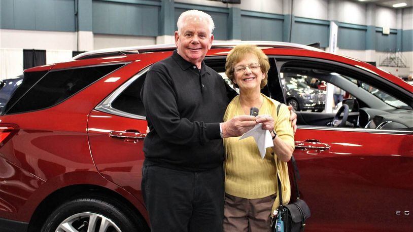 A highlight of the 2018 Dayton Auto Show, held Feb. 22-25 at the Dayton Convention Center, was the chance to win a two-year lease on a 2018 Chevrolet Equinix LT SUV. The winner was Nancy Sobal; she was congratulated by Joe Johnson of Joe Johnson Chevrolet, who represented the Miami Valley Chevrolet Dealers Association that gave away the lease Feb. 25. Contributed photo