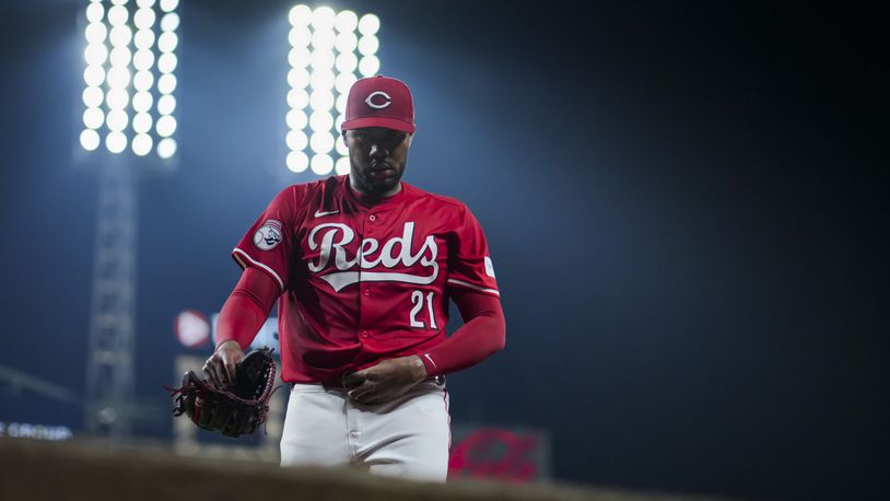 Cincinnati Reds' Hunter Greene walks to the dugout after striking out Milwaukee Brewers' Jake Bauers during the third inning of a baseball game in Cincinnati, Wednesday, April 10, 2024. (AP Photo/Aaron Doster)