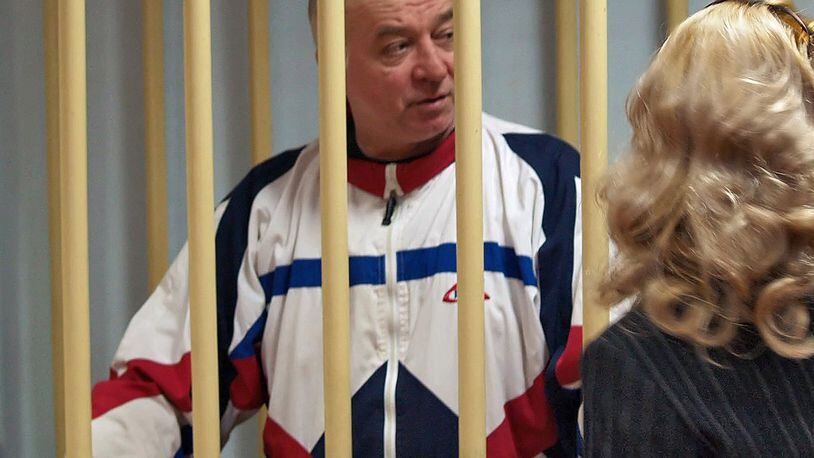 A photo dated Aug. 9, 2006 shows Sergei Skripal talking from a defendants cage to his lawyer during a hearing at the Moscow District Military Court in Moscow, Russia