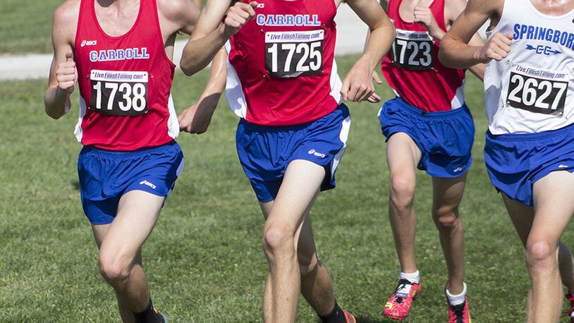 Carroll runners (left to right) Karl Grossman, Grant Arnold and Kevin Agnew led the Patriots to victory Saturday in the Division I race at the Cedarville University Friendship Invitational. Alex Berardi led Springboro to a second-place finish. JEFF GILBERT / CONTRIBUTED