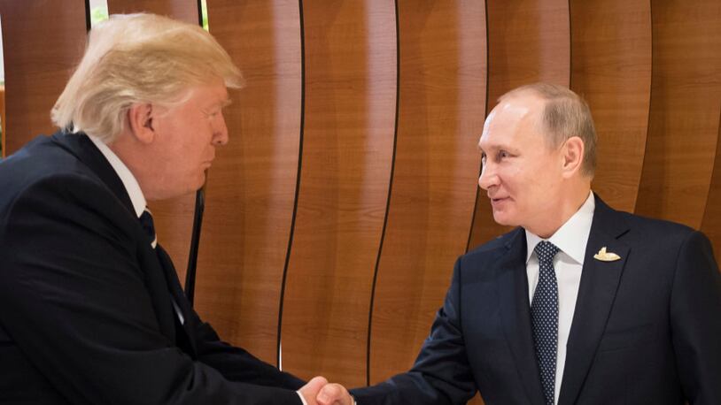 President Donald Trump met with Russian President Vladimir Putin (right) earlier this month at the G20 summit.