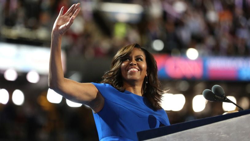 First lady Michelle Obama acknowledges the crowd after delivering remarks on the first day of the Democratic National Convention at the Wells Fargo Center, July 25, 2016 in Philadelphia, Pennsylvania. The four-day Democratic National Convention kicked off July 25. (Photo by Joe Raedle/Getty Images)