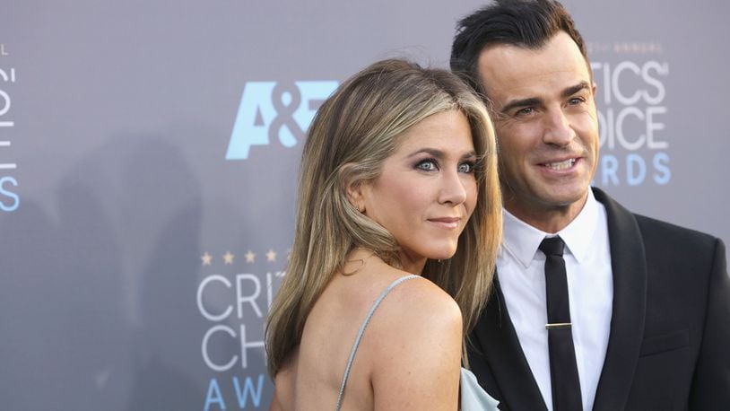 Actors Jennifer Aniston (L) and Justin Theroux attend the 21st Annual Critics' Choice Awards at Barker Hangar on January 17, 2016 in Santa Monica, California.