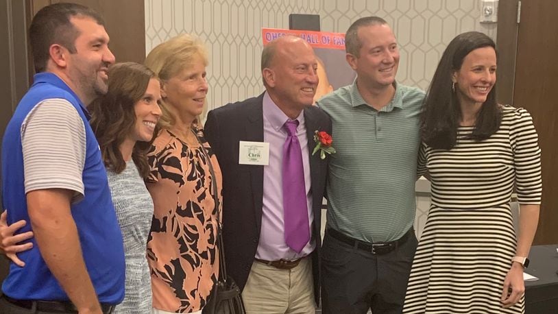 Chris Adams is pictured with his family at the Ohio Basketball Coaches Association Hall of Fame induction on Aug. 21, 2021.