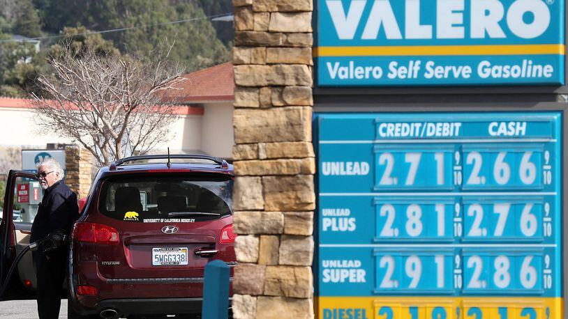 Gas prices are displayed at a Valero gas station on February 9, 2015 in San Rafael, California.