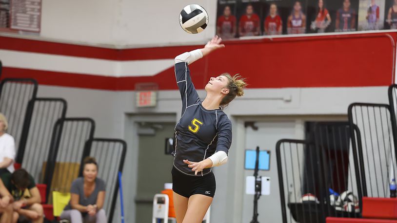 Northeastern High School senior Samantha Wiseman serves the ball during their match at Southeastern earlier this season. The Jets are the No. 1 overall seed in the D-III tournament at Brookville. CONTRIBUTED PHOTO BY MICHAEL COOPER