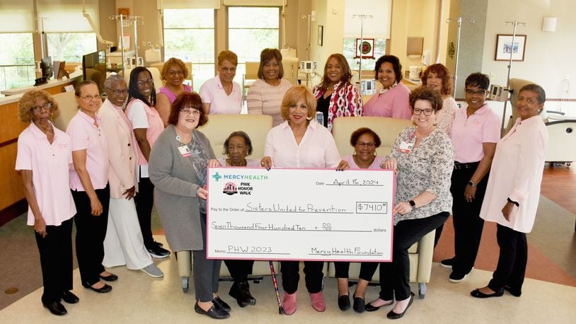This photo of members of Sisters United was taken at the Springfield Cancer Center when the Mercy Health Foundation presented the organization with a check. Standing at center is founder Patty Young. CONTRIBUTED