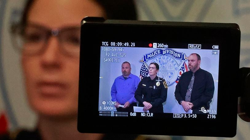Springfield Police Chief Allison Elliott along with Lt. Jeff Williams, left, and Sgt. James Byron are seen through a video camera as they give a press conference Friday, Jan. 6, 2023. BILL LACKEY/STAFF
