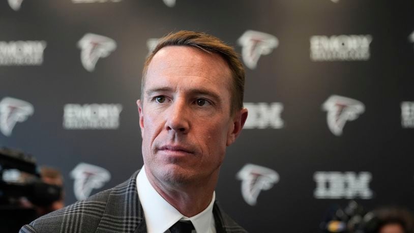 Former Atlanta Falcons quarterback Matt Ryan looks on after speaking about his retirement during a news conference Monday, April 22, 2024, in Flowery Branch, Ga. (AP Photo/Brynn Anderson)