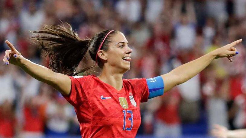 United States' Alex Morgan celebrates after scoring her side's second goal during the Women's World Cup semifinal soccer match between England and the United States, at the Stade de Lyon, outside Lyon, France, Tuesday, July 2, 2019.