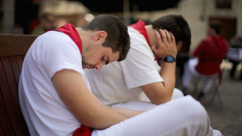 PAMPLONA, SPAIN - JULY 09: Revellers take an afternoon siesta sleeping off the effects of partying during the fourth day of the San Fermin Running Of The Bulls festival, on July 9, 2014 in Pamplona, Spain. The annual Fiesta de San Fermin, made famous by the 1926 novel of US writer Ernest Hemingway 'The Sun Also Rises', involves the running of the bulls through the historic heart of Pamplona. (Photo by Christopher Furlong/Getty Images)
