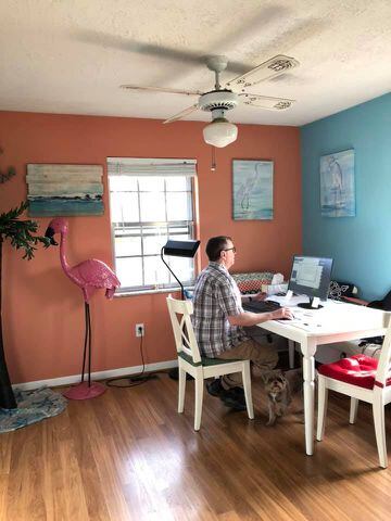 Photos:  Furry co-workers, kids and mask. Daytonian show how they are working (or not) from home during Coronavirus crisis