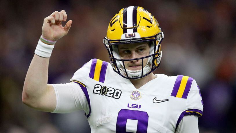 LSU quarterback Joe Burrow celebrates a touchdown pass against Clemson during the College Football Playoff National Championship game at Mercedes Benz Superdome in New Orleans on January 13, 2020. (Chris Graythen/Getty Images/TNS)