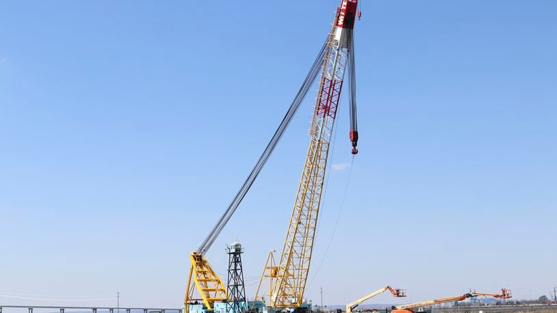 FILE - The Chesapeake 1000 crane, which will be used to help remove wreckage from the collapse of the Key Bridge, is docked at Tradepoint Atlantic in Sparrows Point, Md., March 29, 2024. The floating crane that’s been hauling away shattered steel from the collapsed Baltimore bridge played a much different role during the Cold War. (AP Photo/Brian Witte, File)