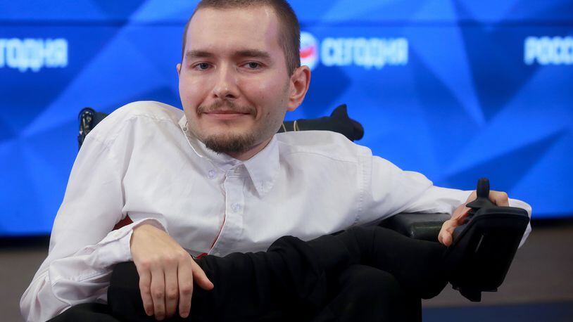 Programmer Valery Spiridonov pictured during a press conference on creating the first autopilot wheelchair system called Clever Chair. Spiridonov intends to undergo the world's first full head transplant that is to be performed by Italian neurosurgeon Sergio Canavero. (Photo by Sergei Fadeichev\TASS via Getty Images)