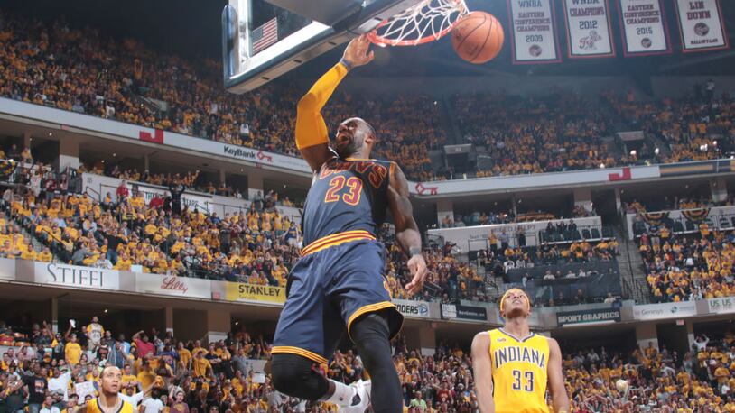 LeBron James (23) of the Cleveland Cavaliers dunks against the Indiana Pacers during Game 3 of the Eastern Conference quarterfinals Thursday night.