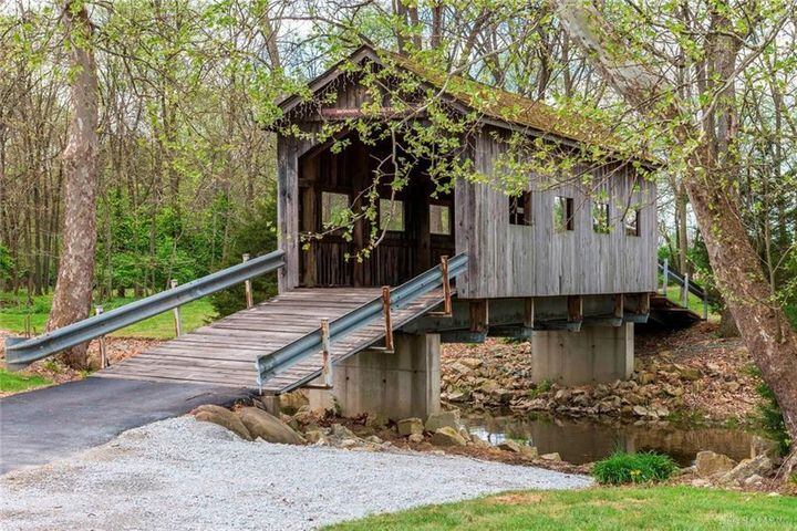 PHOTOS: Nearly 10-acre Miami County property listed has luxury home, stocked fishing pond