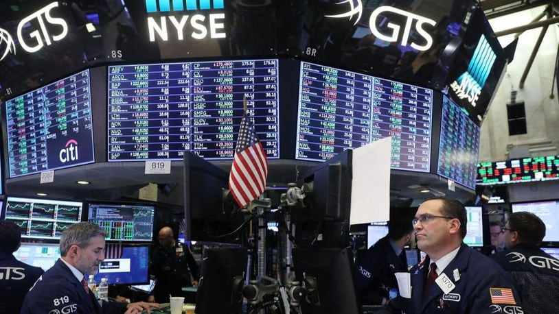 Traders work on the floor of the New York Stock Exchange (NYSE) on February 6, 2018 in New York City. Following Monday's over 1000 point drop, the Dow Jones Industrial Average closed up over 500 points.