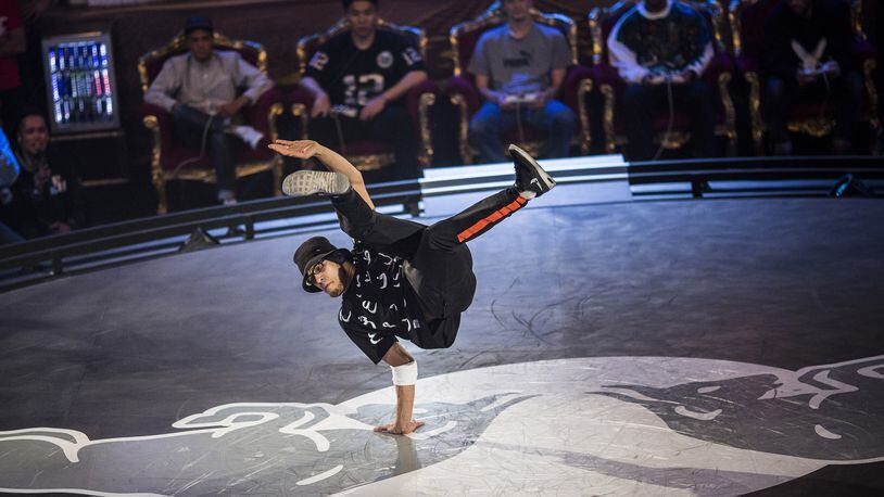 In this handout image provided by Red Bull, Ali "Lilou" Ramdani of France competes at the Red Bull BC One Breakdancing World Finals at La Grande Halle de la Villette on November 28, 2014 in Paris, France. The 2024 Summer Olympics in Paris may see breakdancing added to the official events, alongside gymnastics, track, swimming and others.  (Photo by Romina Amato/Red Bull via Getty Images)