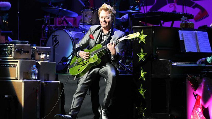 The Brian Setzer Orchestra performed Saturday, Dec. 5, 2015 at a sold-out Cobb Energy Centre in Atlanta as part of its annual Christmas Rocks concert. Fans were treated to a rousing night of Stray Cats and holiday standards with the 3-time Grammy winner's swing and rockabilly interpretations. Robb D. Cohen/ RobbsPhotos.com
