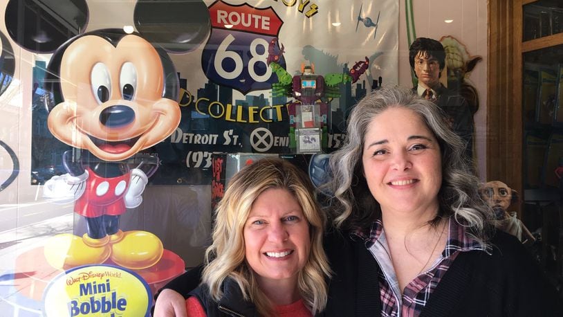 The destination for Wednesday’s Cash Mob in Xenia is Route 68 Vintage Toys and Collectibles, 68 South Detroit Street. Downtown Xenia property owner Jennifer Dunn (left), pictured with store owner Danielle Eldridge, said she is working to help revitalize the downtown area and started the monthly Cash Mob events to support downtown businesses. RICHARD WILSON/STAFF