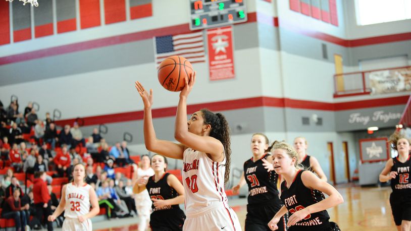 Cedarville senior Celeste Rucker drives for two of her eight points in the Division IV district final at Troy High School on Saturday. Cedarville lost to Fort Loramie 57-45. Greg Billing / Contributed