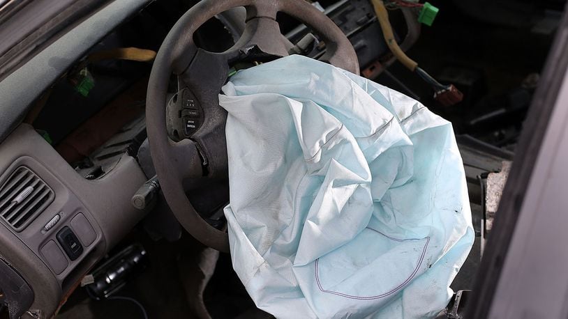 A deployed airbag is seen in a 2001 Honda Accord at the LKQ Pick Your Part salvage yard on May 22, 2015 in Medley, Florida. (Photo by Joe Raedle/Getty Images)