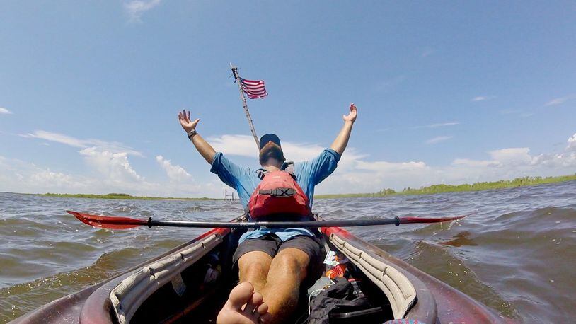 Wittenberg graduate Andy Gallatin takes a photof himself during his 3,052-mile kayak trip. Submitted photo