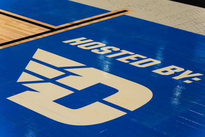 PHOTOS: NCAA First Four basketball court installation at UD Arena