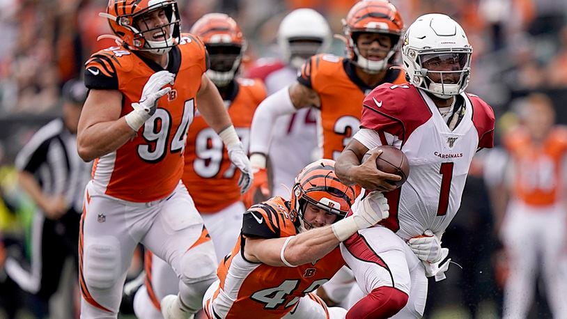 CINCINNATI, OHIO - OCTOBER 06: Kyler Murray #1 of the Arizona Cardinals is tackled by Clayton Fejedelem #42 of the Cincinnati Bengals during the NFL football game at Paul Brown Stadium on October 06, 2019 in Cincinnati, Ohio. (Photo by Bryan Woolston/Getty Images)