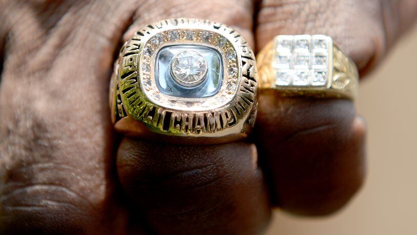 Super Bowl VII: Larry Little of the undefeated 1972 Super Bowl Champion Miami Dolphins shows off his super bowl ring after their first White House ceremony honoring their historic season on August 20, 2013 in Washington, DC. (Photo by Jonathan Newton / The Washington Post via Getty Images)