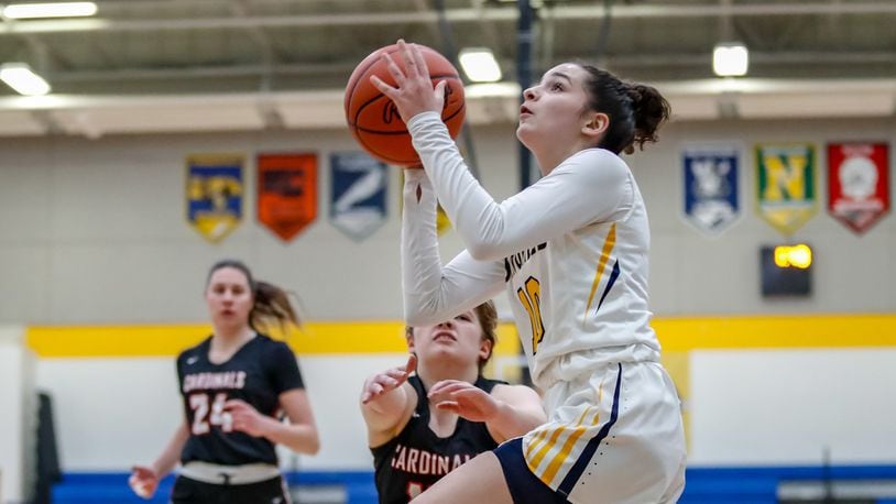 Springfield High School senior Mickayla Perdue drives to the hoop during the Wildcats game against Triad on Monday, Jan. 27. Perdue leads the GWOC in scoring at 22.1 points per game. CONTRIBUTED PHOTO BY MICHAEL COOPER