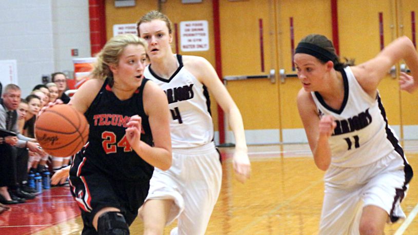Tecumseh junior Presley Griffitts (24) scored 23 points as No. 7 Tecumseh beat No. 3 Lebanon 64-58 in the D-I sectional on Tuesday at Troy. GREG BILLING / CONTRIBUTED