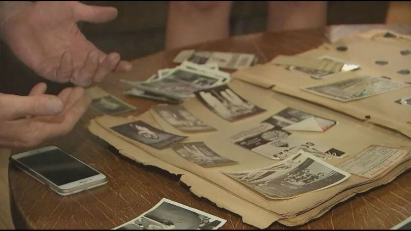 A man was able to reunite a family with a photo album found along the highway. (Photo: Boston25News.com)
