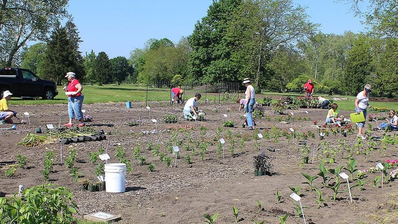 Clark County Master Gardener volunteers help plant the research garden in Snyder Park in May. Applications are being accepted now for Master Gardener training scheduled to begin in January. JEFF GUERINI/STAFF