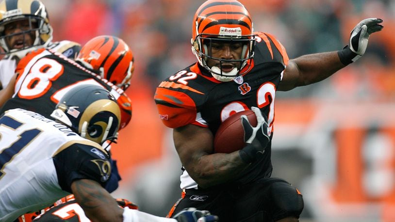 Former Bengals halfback Rudi Johnson, ranked by fans and media as the No. 21 retired Cincinnati player, is seen here picking on the Rams in a 2007 game at Paul Brown Stadium.