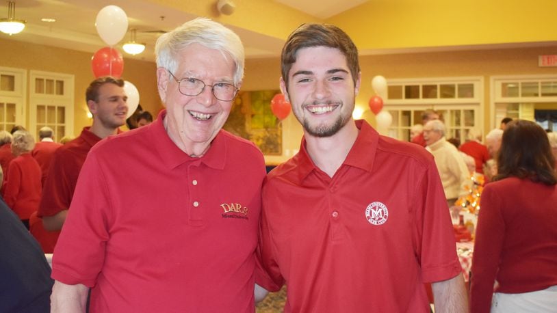 The Knolls of Oxford resident Jack Southard and a Miami University student from the glee club. CONTRIBUTED