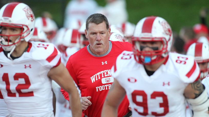 Wittenberg’s Joe Fincham takes the field with the players before a game against Denison on Saturday, Sept. 29, 2018, at Deeds Field in Granville. David Jablonski/Staff