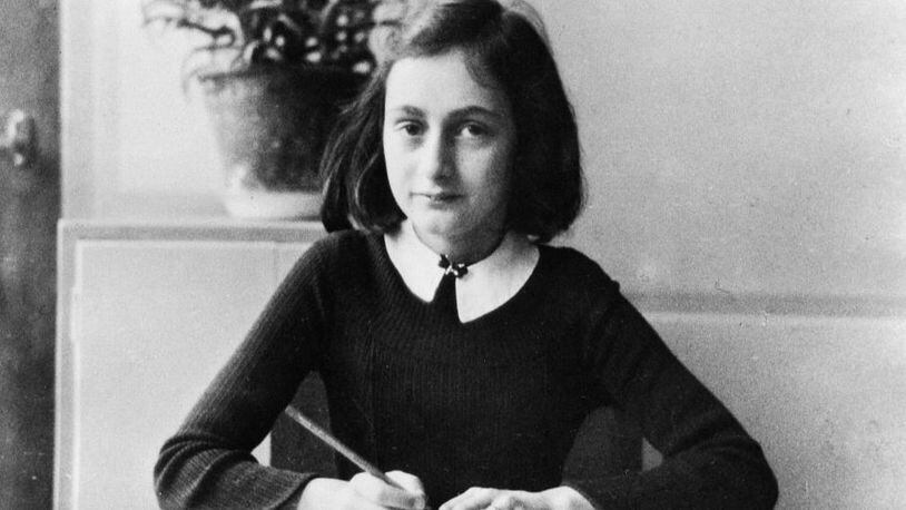 Anne Frank, German Jew who emigrated with her family to the Netherlands during the Nazi era. Separated from the rest of her family, she and her sister died of typhoid fever in the concentration camp Bergen-Belsen - As a 12-year old doing her homework - 1941 (Photo by ADN-Bildarchiv/ullstein bild via Getty Images)